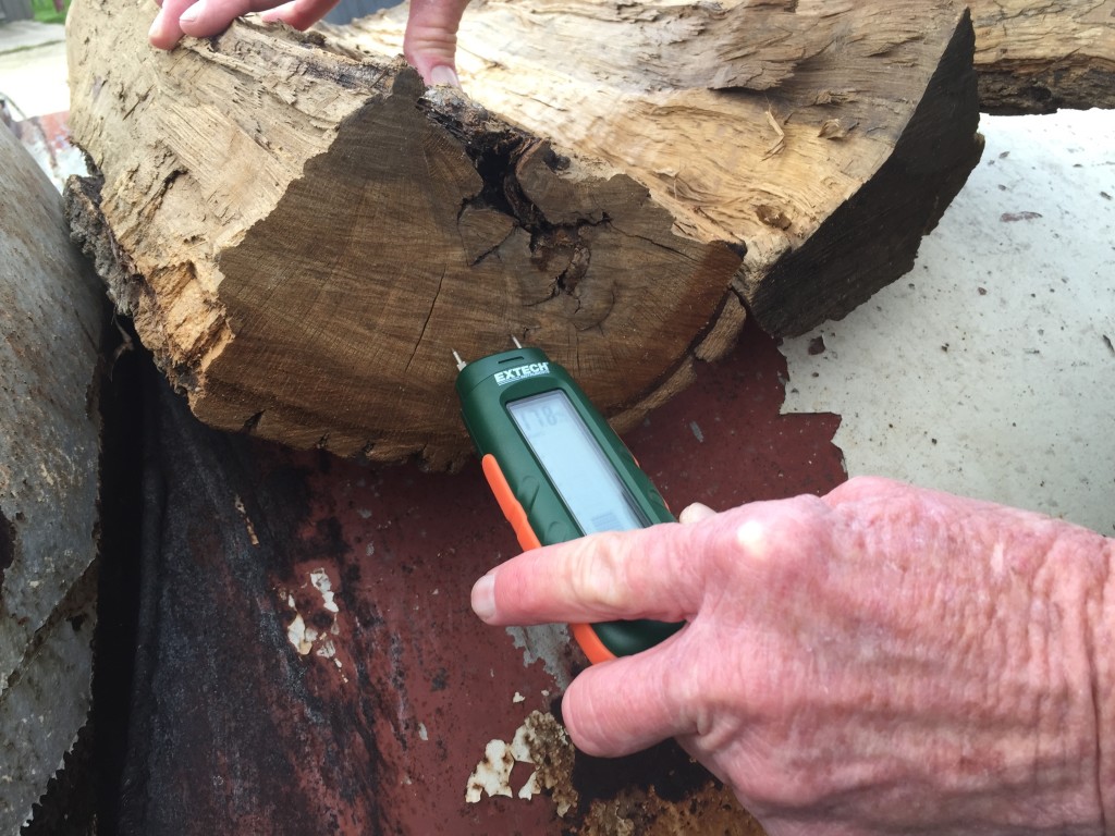 Checking moisture content of split log
