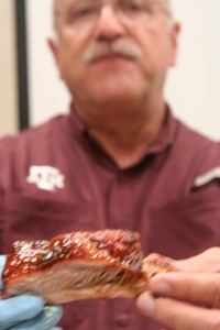 Dr. Savell holds a BBQ rib