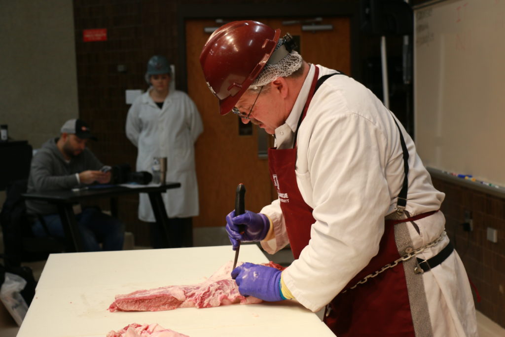 Davey Griffin dissecting a brisket