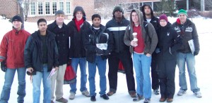 Lab members outdoors in the snow